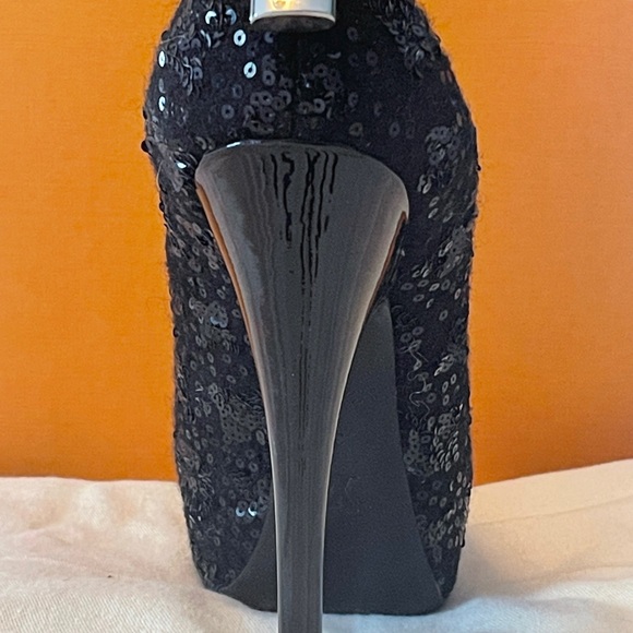 LV black cloth and sequin, peep toe, silver Vuitton lock charm, 4.5in heels. - Picture 3 of 4